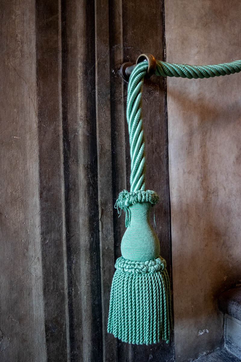 Teal Tassel On a Stairway